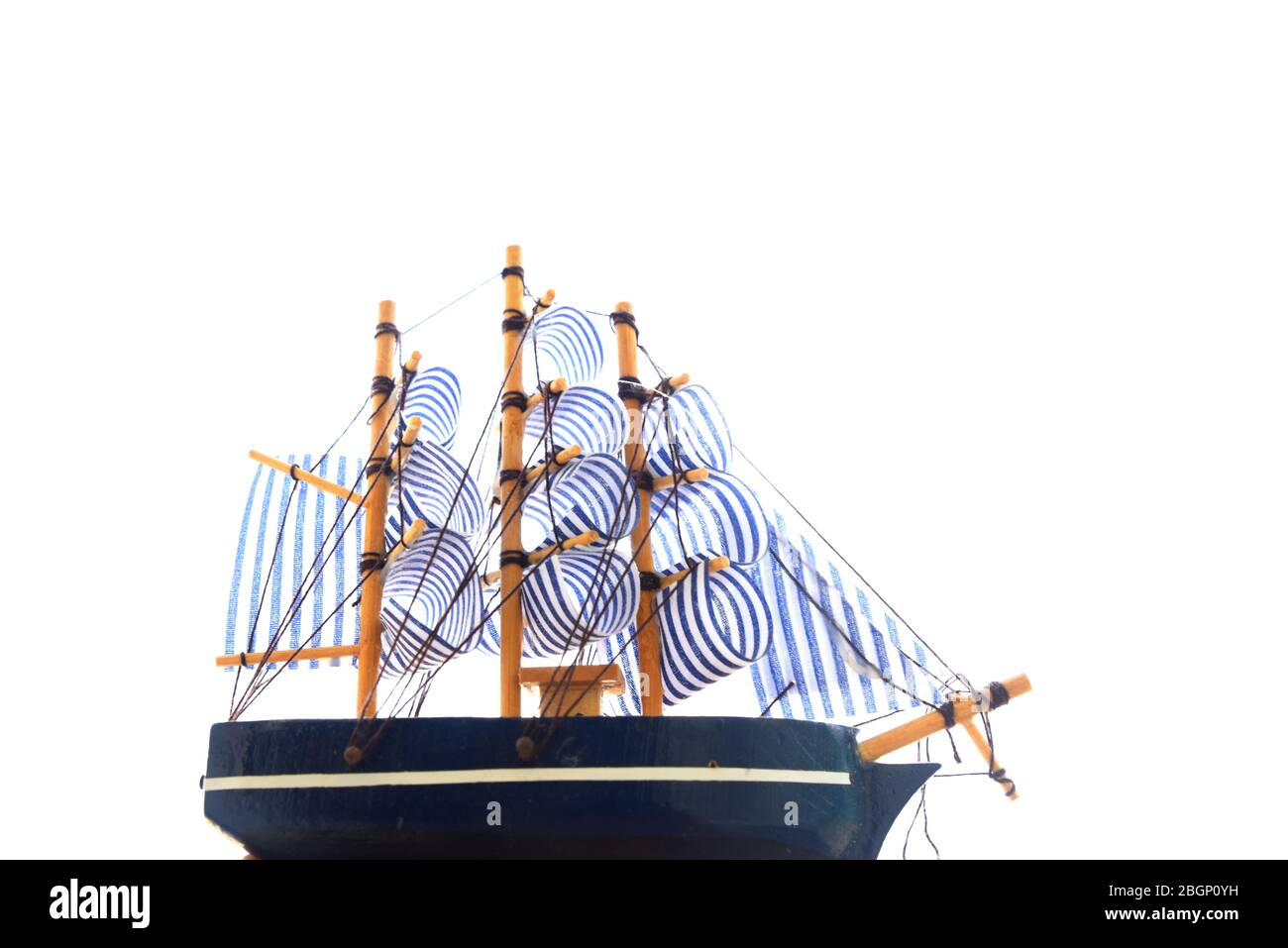 wooden toy boat on white background Stock Photo - Alamy