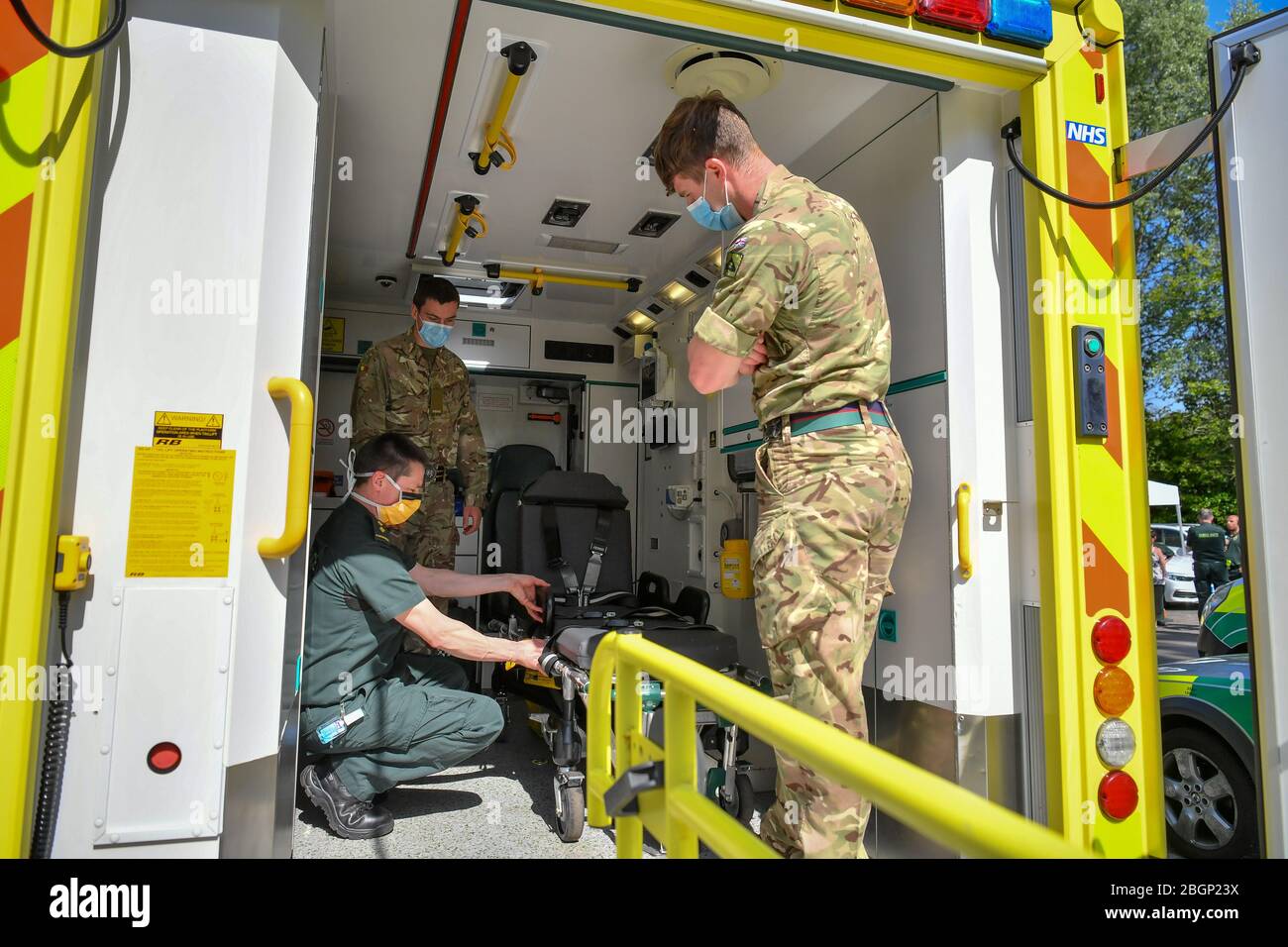 Military personnel from 1st Battalion, Royal Welsh are shown in the back of an ambulance during vehicle familiarisation as they take part in Military Ambulance Driver Induction Training at Taunton Ambulance Station, Taunton, Somerset, to support South West Ambulance Service Trust (SWAST) in the battle against COVID-19. Stock Photo