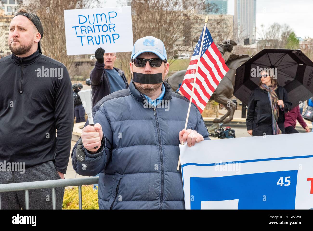CHARLOTTE, NORTH CAROLINA/USA - February 7, 2020: Trump protester awaits the President's visit in Charlotte, North Carolina on February 7, 2020 Stock Photo