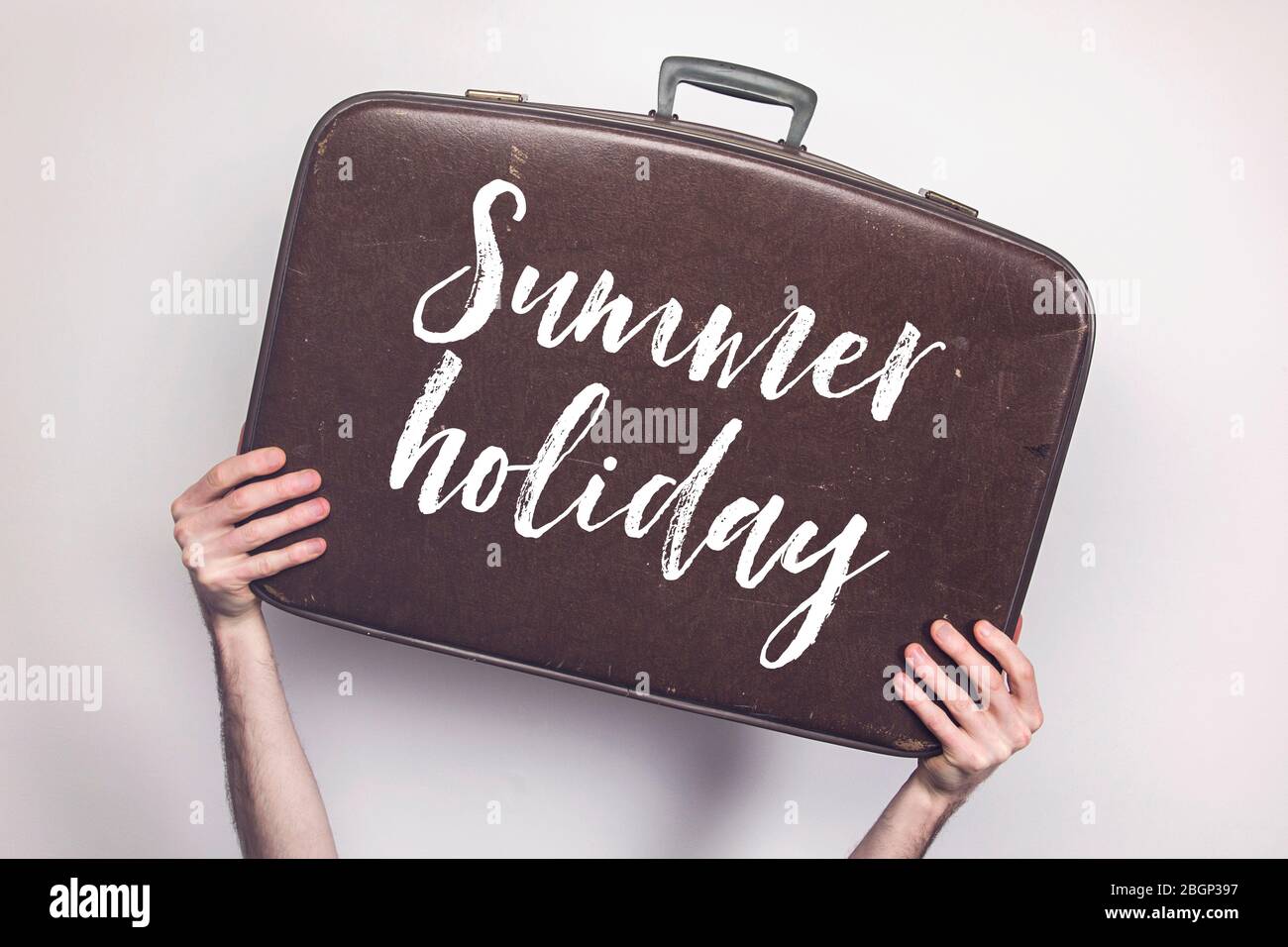 Summer holiday message on a vintage travel suitcase Stock Photo