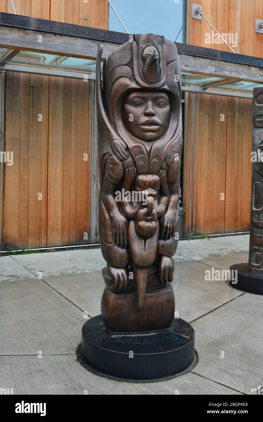 House post in bronze by Tlingit artist Stephen Jackson, situated