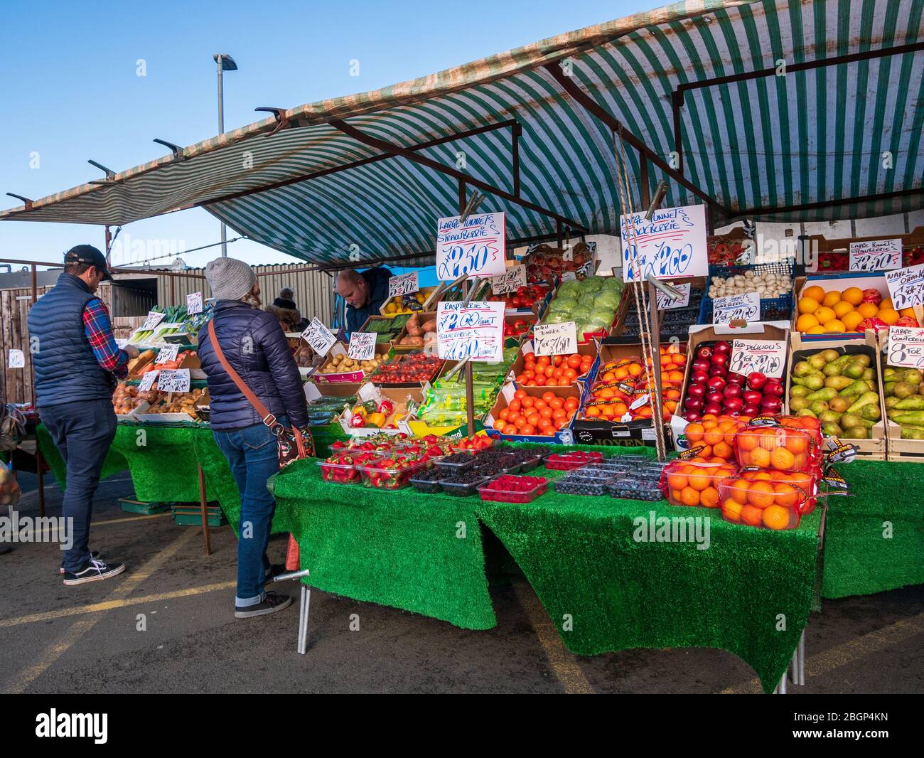 A market stall selling fruit and vegetables at the Sunday Market in