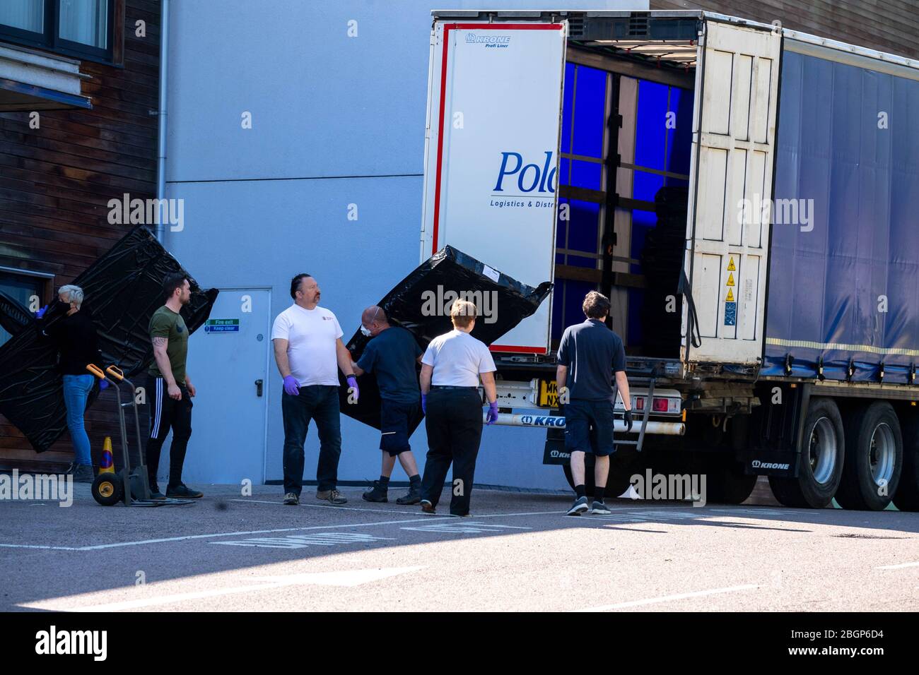 Brentwood Essex, UK. 22nd Apr, 2020. Dozens of new mattresses arrive and are unloaded by NHS staff, volunteers and the Army at the Brentwood Community Hospital that has been converted for Covid-19 use Credit: Ian Davidson/Alamy Live News Stock Photo