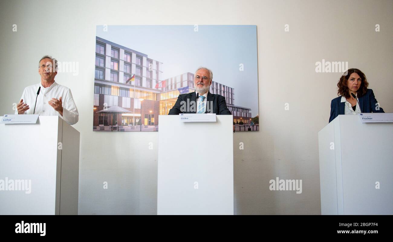 Hamburg, Germany. 22nd Apr, 2020. Ansgar Lohse (l-r), Director of the I. Medical Clinic and Polyclinic of the UKE, Burkhard Göke, Medical Director and Chairman of the Board of the UKE and Nicole Fischer, Institute for Medical Microbiology, Virology and Hygiene of the UKE, speak during a press conference. The University Hospital Eppendorf commented on further developments in the corona crisis. Credit: Axel Heimken/dpa Pool/dpa/Alamy Live News Stock Photo