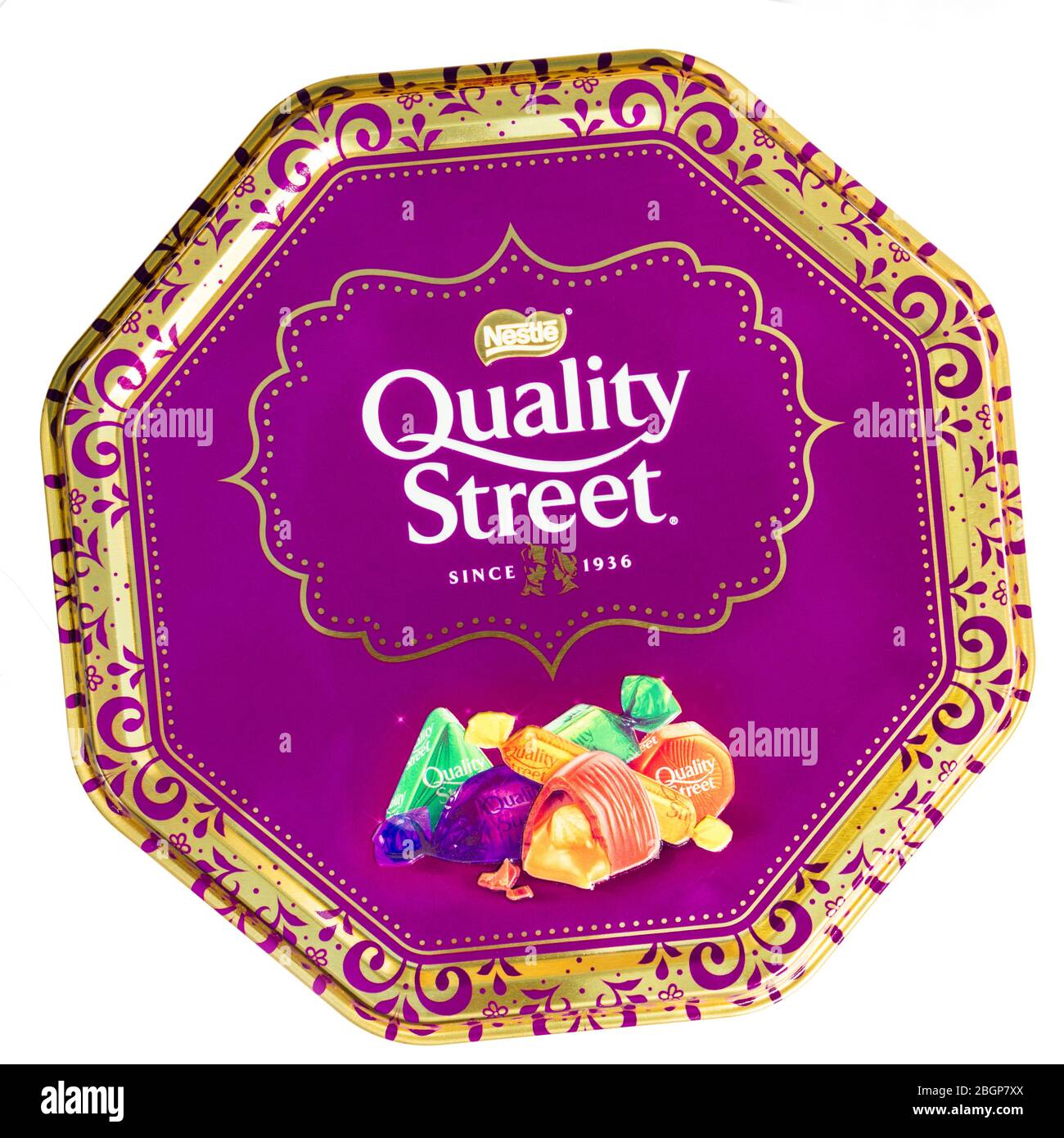 Quality Street tin of chocolates isolated or cut out on a white background, UK. Nestle sweets shot from above. Stock Photo