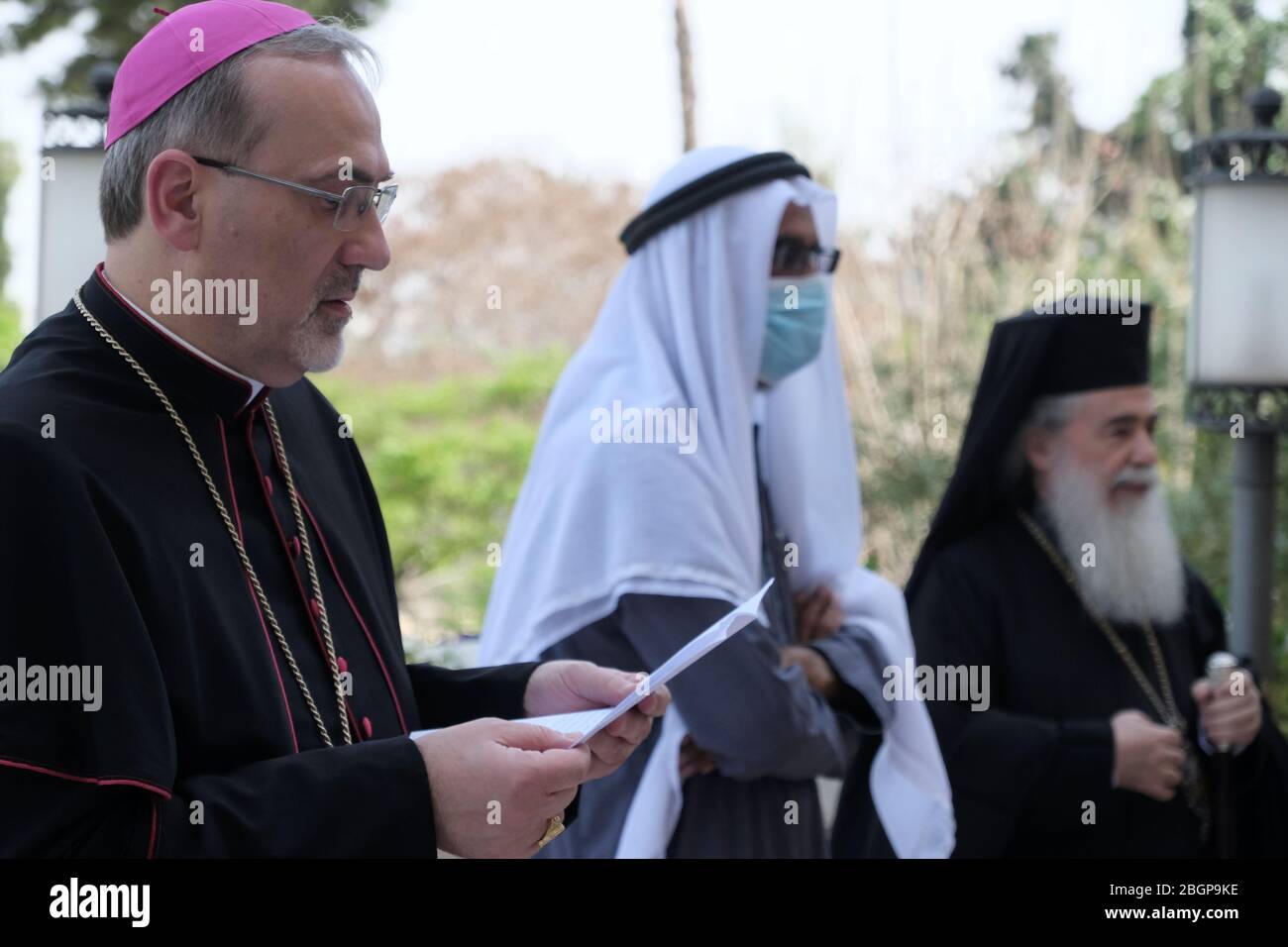 Jerusalem, Israel. 22nd Apr, 2020. Jewish, Christian, Muslim and Druze religious leaders holding an interfaith prayer for the victims and protection from COVID-19 coronavirus pandemic in Jerusalem, Israel. Stock Photo
