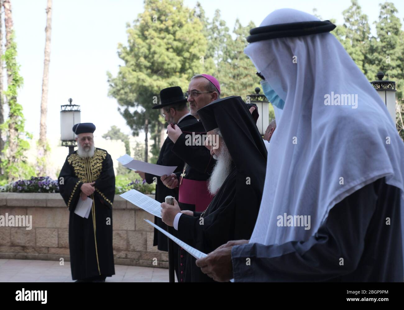 Jerusalem, Israel. 22nd Apr, 2020. Jewish, Christian, Muslim and Druze religious leaders holding an interfaith prayer for the victims and protection from COVID-19 coronavirus pandemic in Jerusalem, Israel. Stock Photo