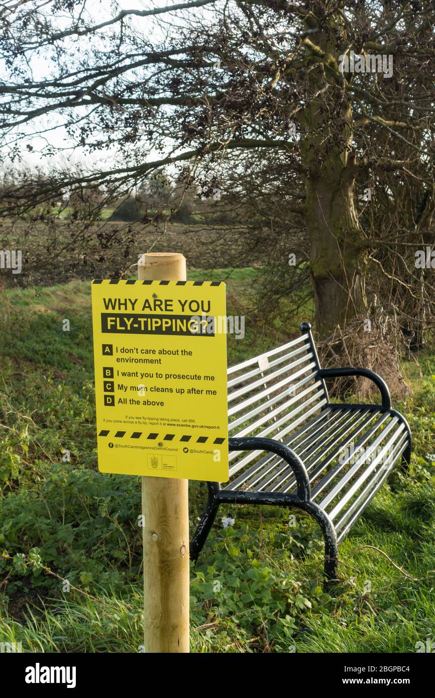 Fly-Tipping notice by seat in Fen road Milton, Cambridgeshire Stock Photo