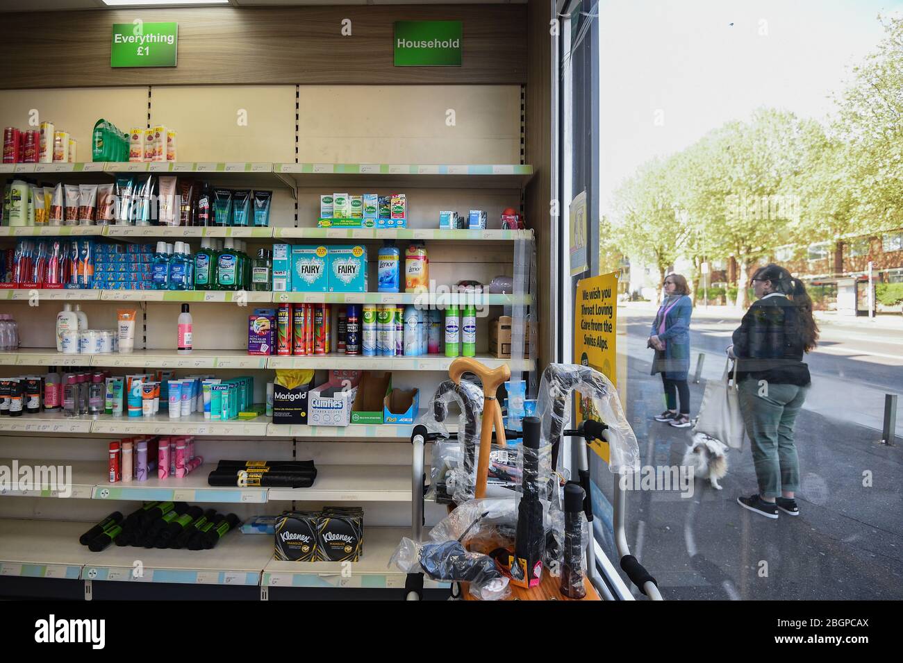 Customers queue outside Copes Pharmacy in Streatham, as the UK continues in lockdown to help curb the spread of the coronavirus. Stock Photo