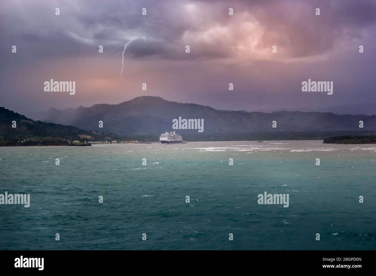 Storm clouds over a cruise ship in the Caribbean sea Stock Photo - Alamy