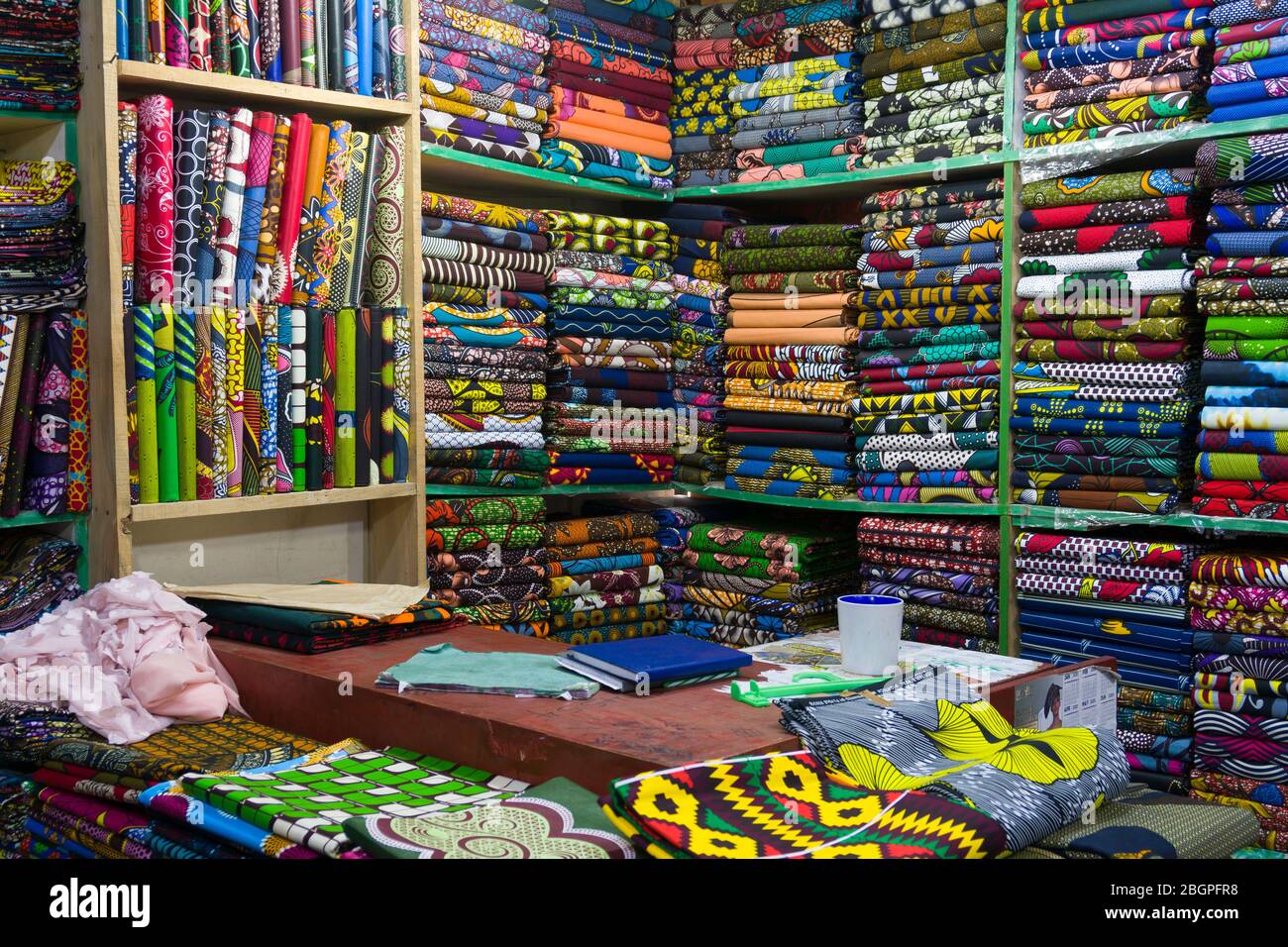 Traditional African fabric shop show a large range of Kanga fabrics, Eastleigh, Nairobi, Kenya.  5 Jan 2020 Stock Photo