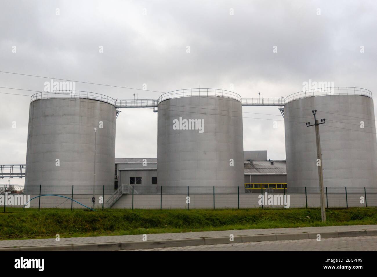 Big oil tank factory constructions from steel Stock Photo