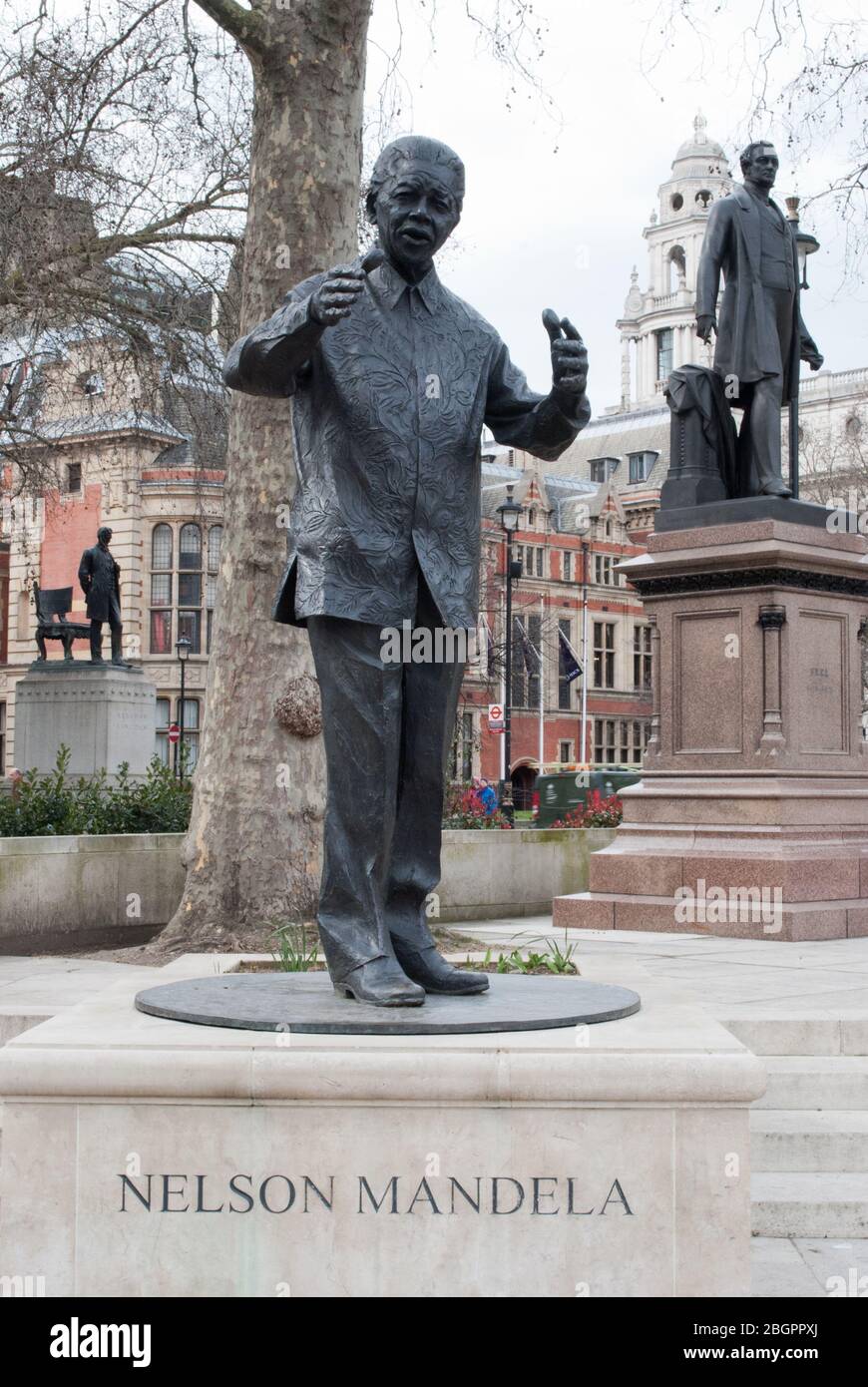 Statue of nelson mandela in parliament square westminster london hires
