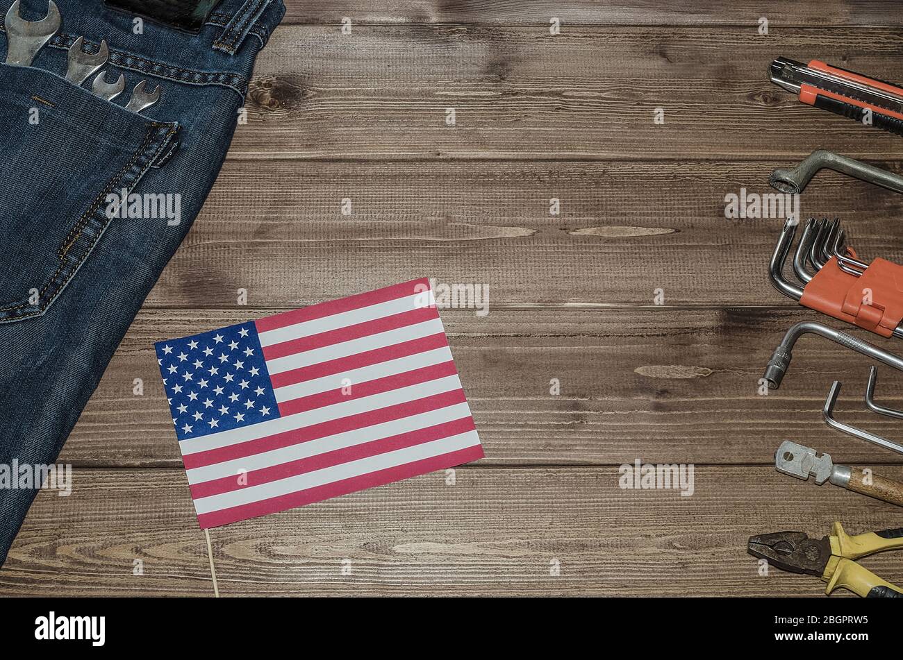 Labor Day In America May 1 A Lot Of Handy Tools On A Dark Wooden Background With The Flag Of America With Copy Space Repair Workshop Stock Photo Alamy