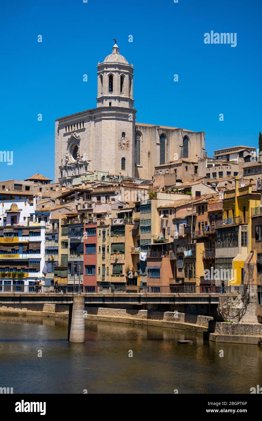 Cathedral of Saint Mary of Girona, the Pont de Sant Agusti over the Onyar river and colorful housing in Girona, Catalonia, Spain, Europe Stock Photo