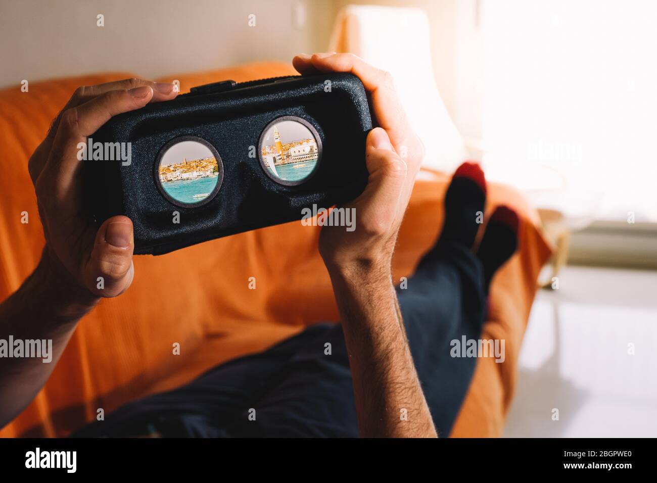 Man using VR headset and doing Virtual reality travel Stock Photo