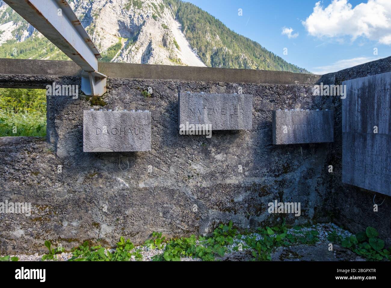 Ljubelj, Slovenia - August 09, 2019: Remains of Camp Loibl in Slovenia. Memorial Plaques with names of Concentration Camps. Memorial park Mauthausen Stock Photo