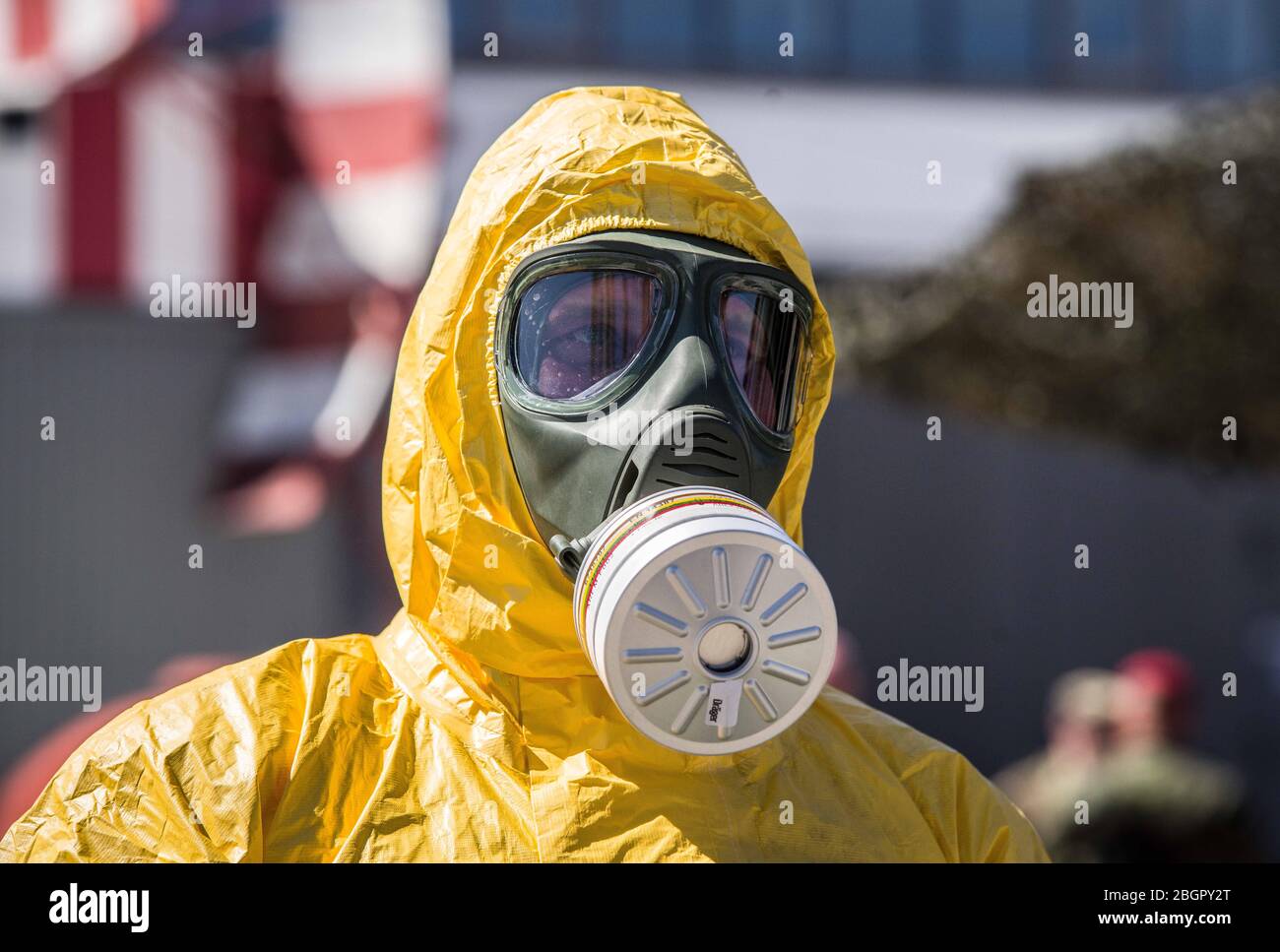 Neubiberg Bei Muenchen, Bavaria, Germany. 22nd Apr, 2020. German Bundeswehr soldiers wear gas masks and Dupint TyChem C protective clothing while mixing the constituents together to make Oxicide, a surface disinfectant used in the fight against Coronavirus. Germany is currently at 148,174 positive diagnoses with 4,961 deaths. Credit: Sachelle Babbar/ZUMA Wire/Alamy Live News Stock Photo