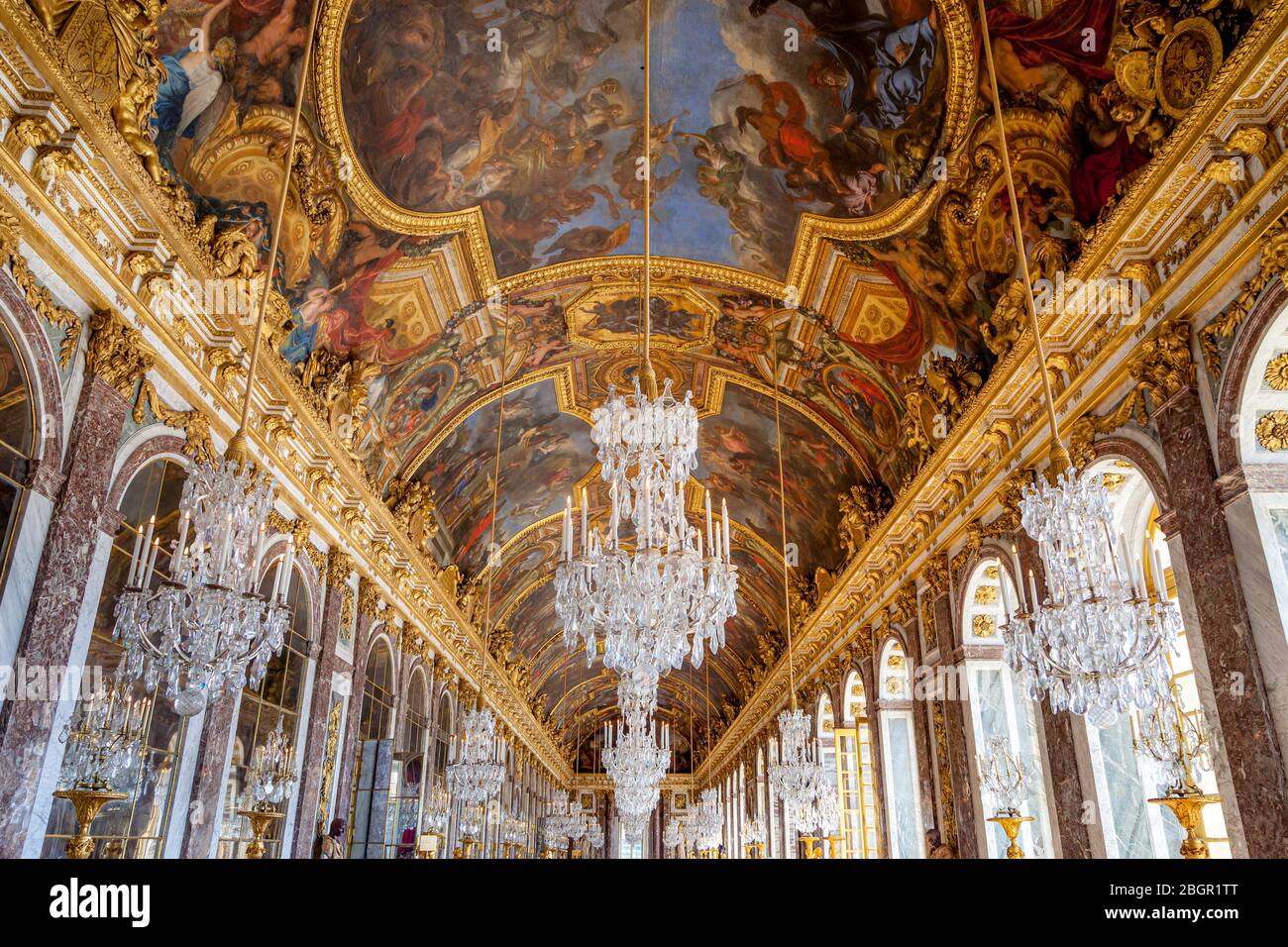 Ceiling and chandeliers (Lustre) in the Hall of Mirrors, Chateau de Versailles, France Stock Photo