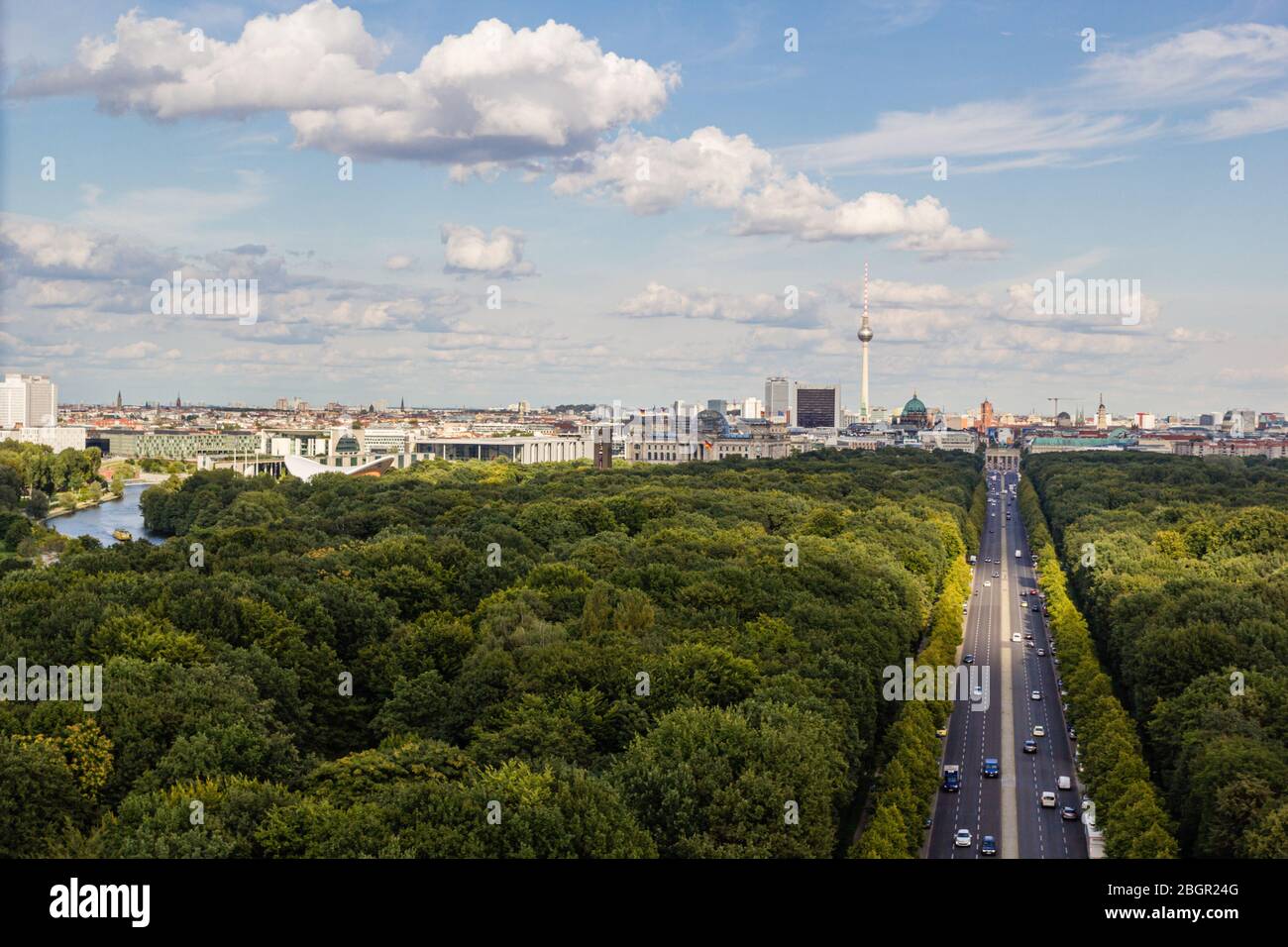 Cityscape of Berlin and road in Tiergarten park landscape in cloudy day Stock Photo