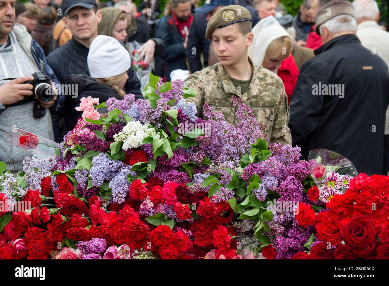 Kiev, Ukraine - May 9, 2019: Student in uniform lays flowers at the ...
