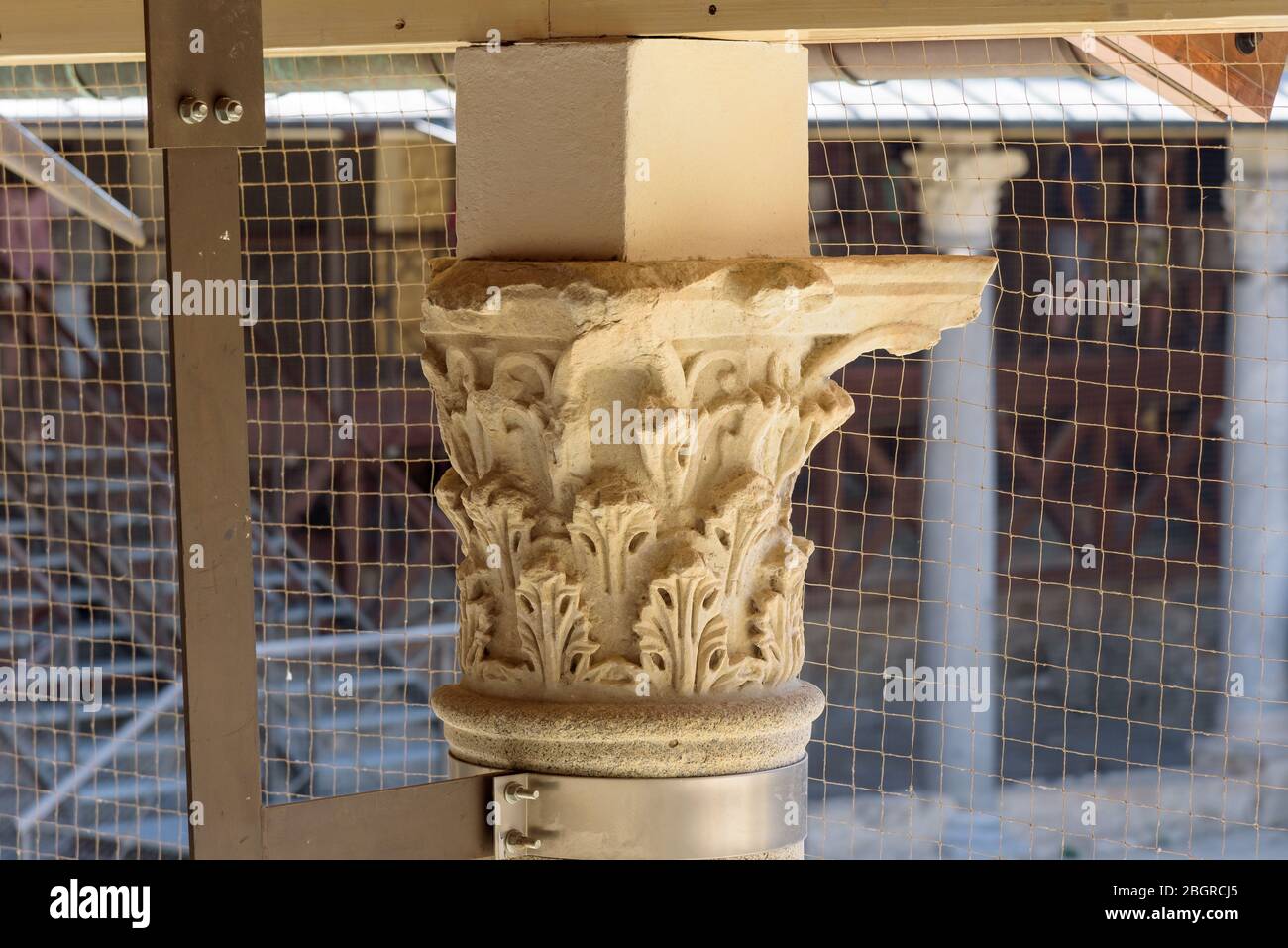 Piazza Armerina, Sicily, Italy - August 24, 2017: Closeup of ancient column decorationin the famous roman house Villa Romana del Casale. UNESCO World Stock Photo