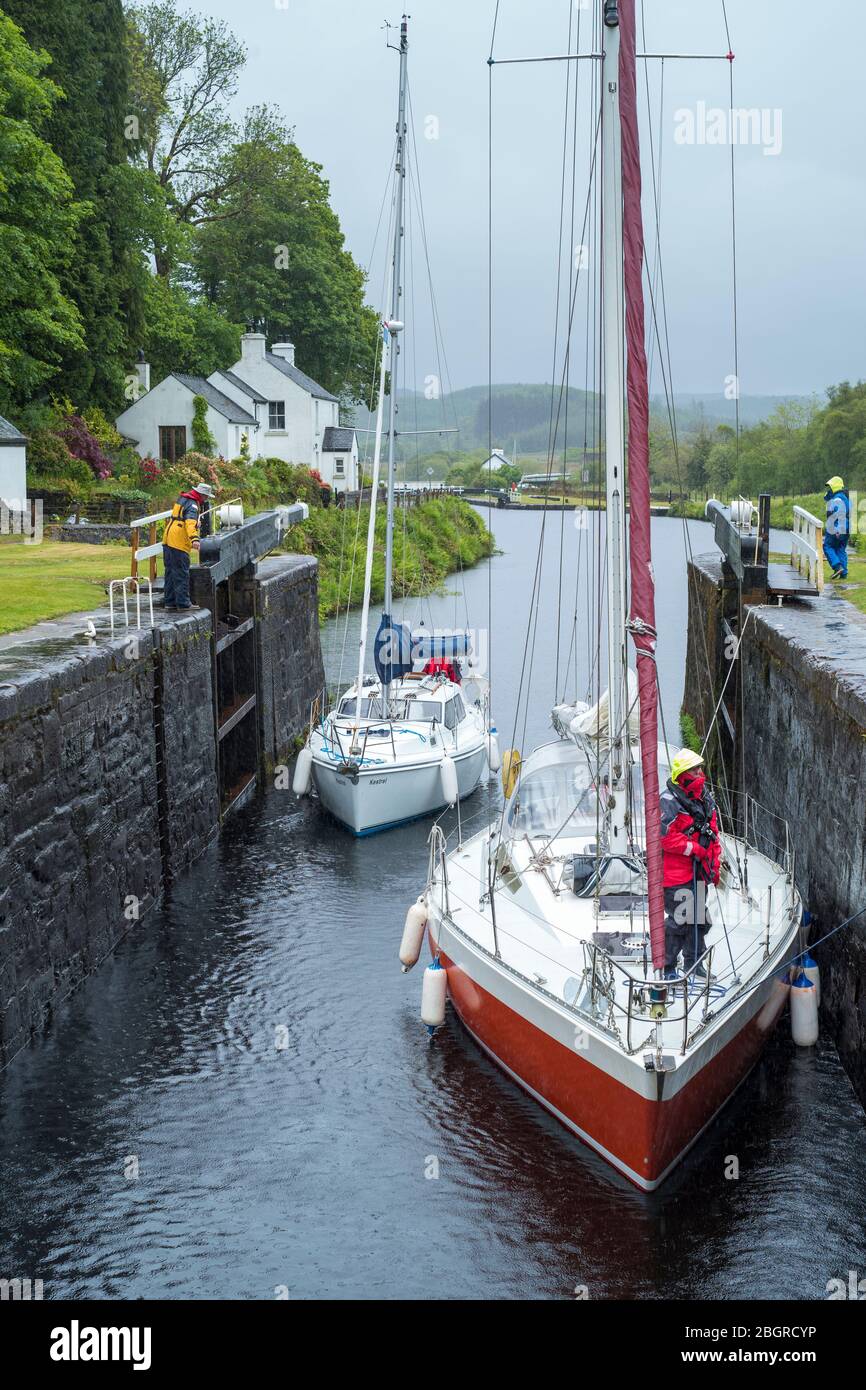 Yachts in a lock on Crinan Canal at Cairbaan near Lochgilphead, Argyll and Bute, Scotland Stock Photo