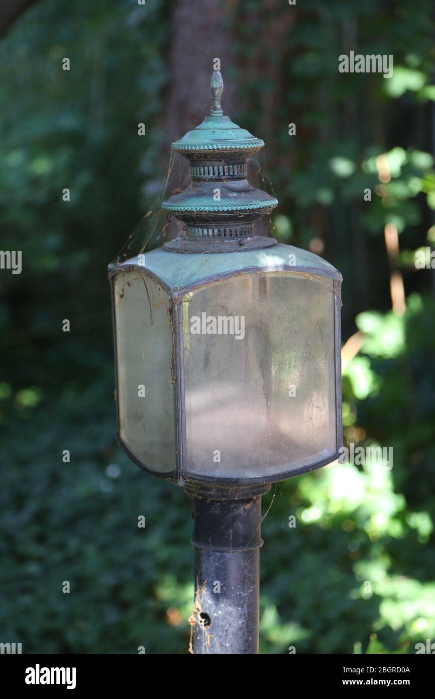 Dusty old lamp in street Stock Photo