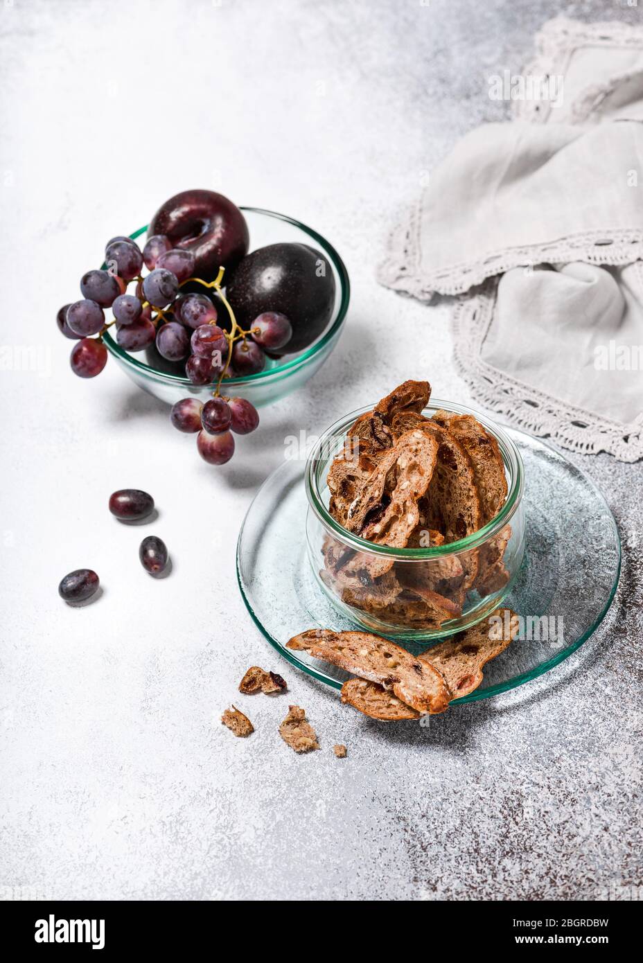 Dried bread made from wheat flour, honey, walnuts, plums and grapes