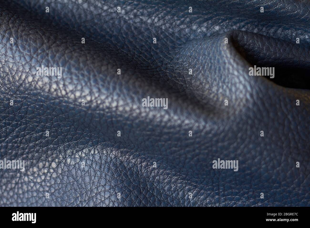 Close-up natural qualitative blue leather texture, selective focus Stock Photo