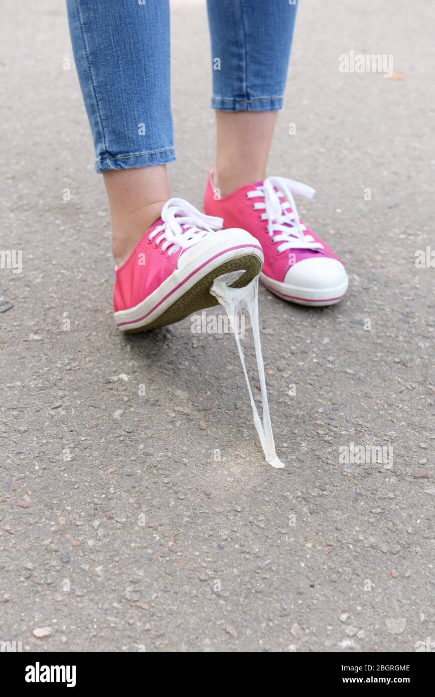 Foot stuck into chewing gum on street Stock Photo - Alamy