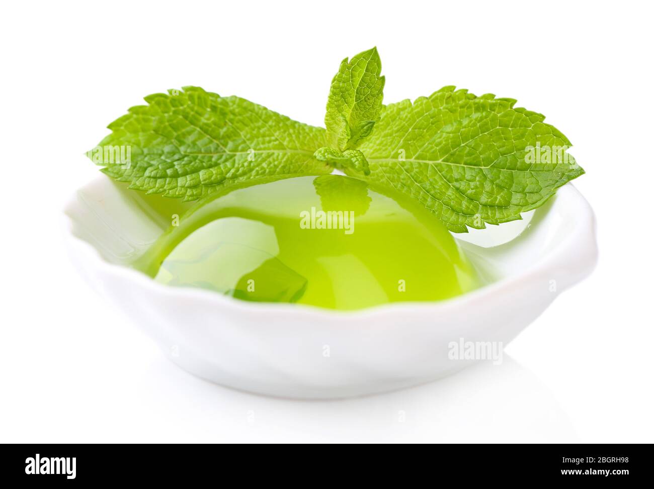 Green jelly with mint leaves isolated on white Stock Photo Alamy