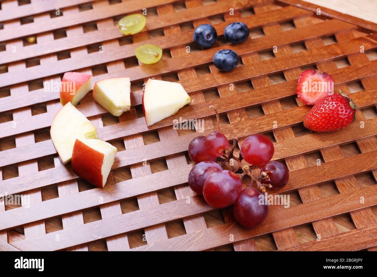 Chopped Fruits Arranged On Cutting Board Stock Photo 1099344800