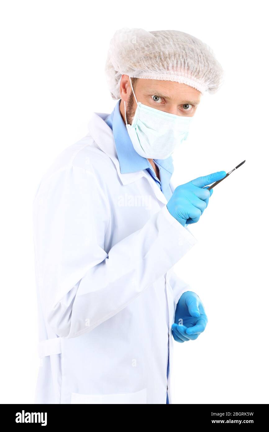 Doctor in glasses holding medical instruments isolated on white Stock ...