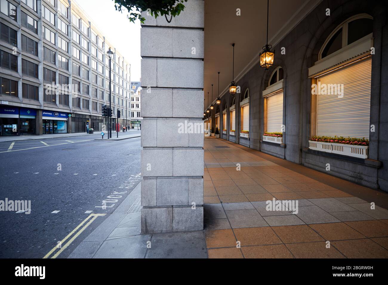 London, U.K. - 22 Apr 2020: The Ritz arcade and part  of a deserted Piccadilly during the coronavirus lockdown. Stock Photo