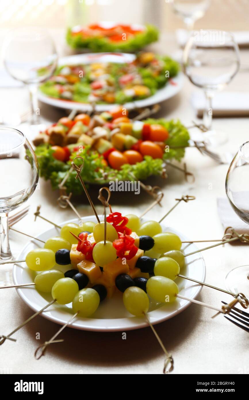 Setting Food Aside Restaurant table setting with tasty food Stock Photo - Alamy