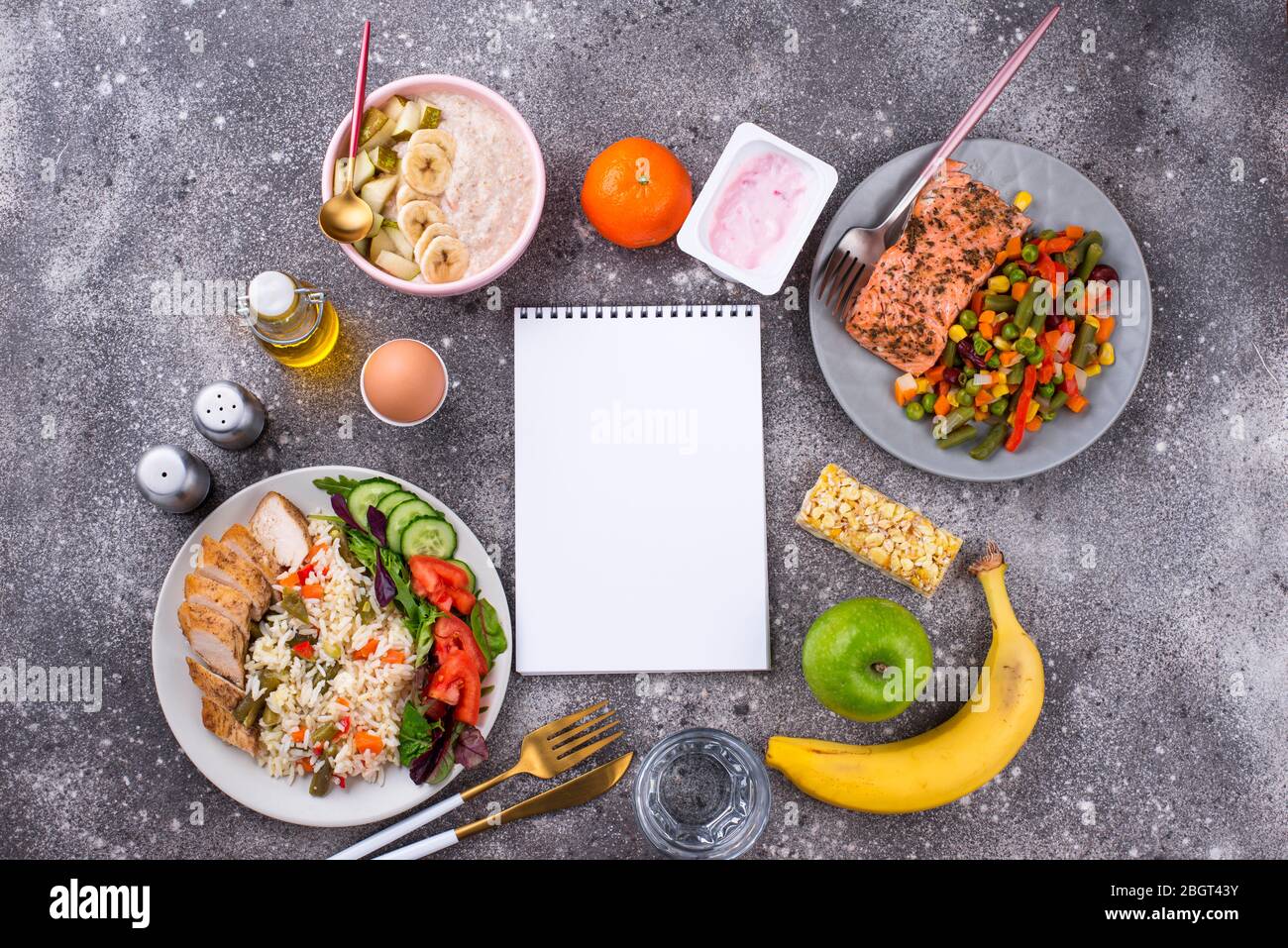 Breakfast, lunch and dinner. Balanced menu Stock Photo - Alamy