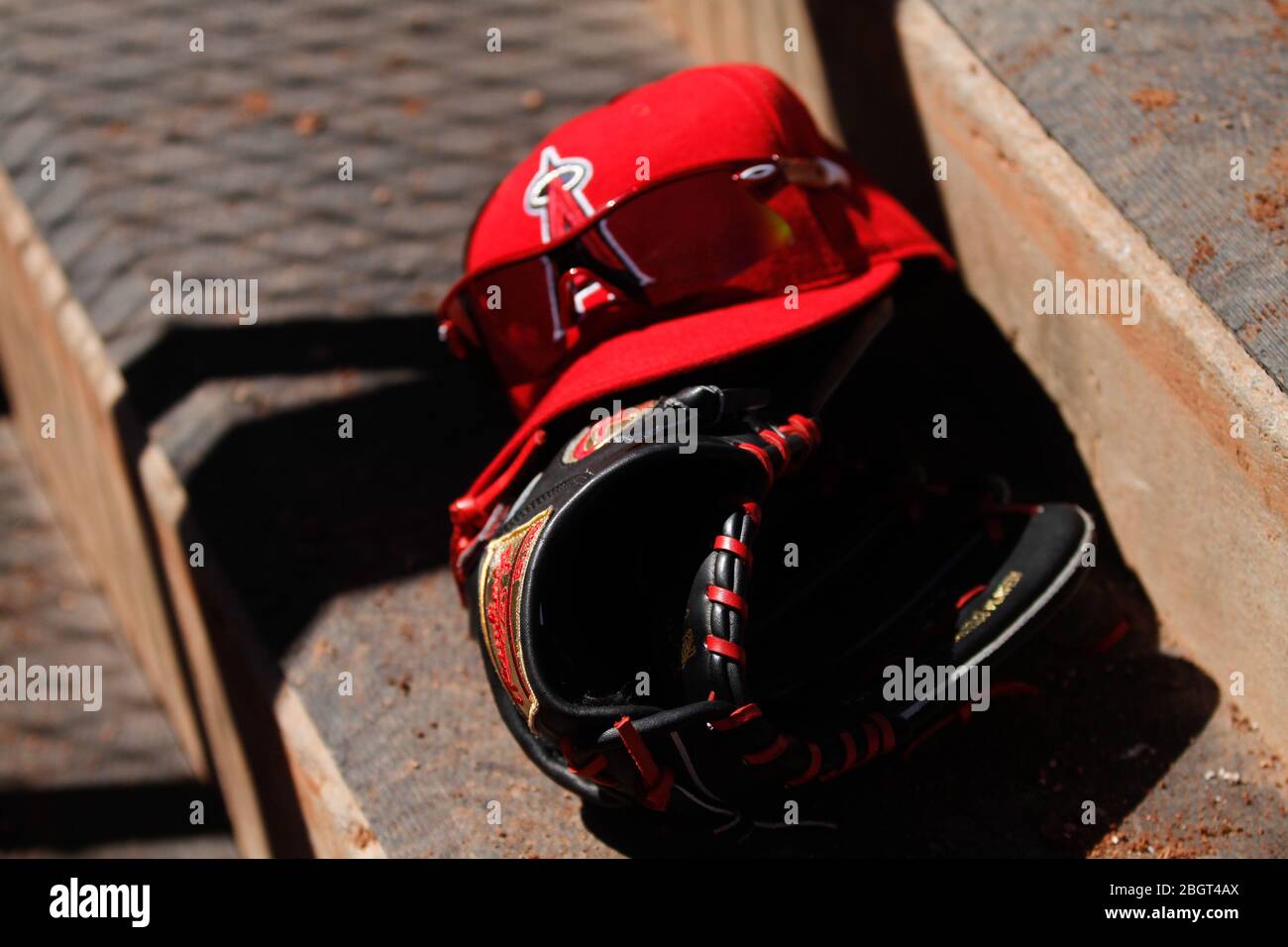Sports glasses, sunglasses and a red cap from the California Angels Surprise Stadium. Cactus league 2012. Surprise Stadium. (Photo: LuisGutierrez / No Stock Photo
