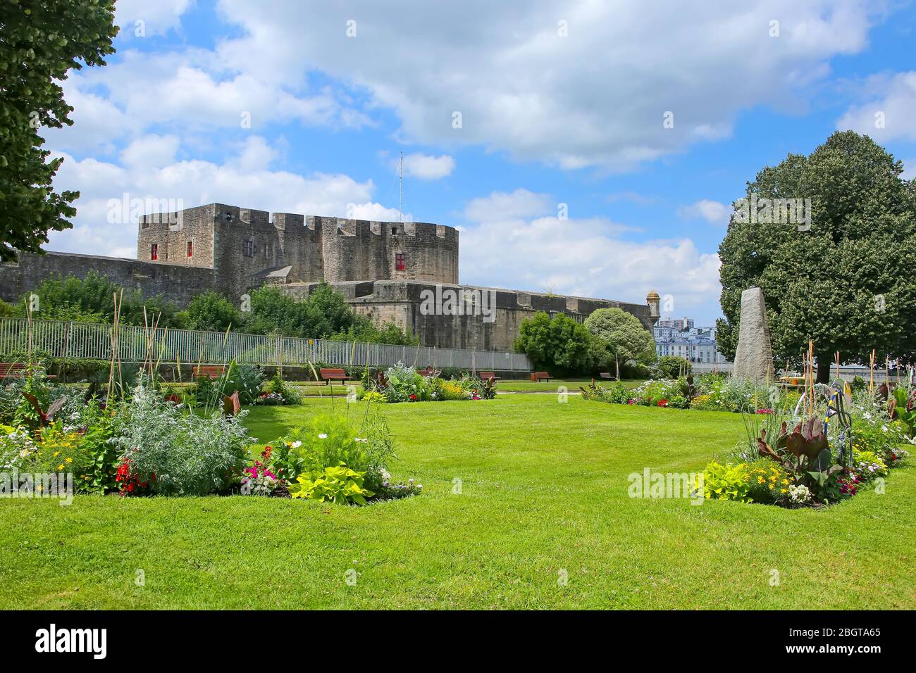 Beautiful public park & gardens with, with the Château de Brest in the background. This is a fort in Brest, Brittany, France. Stock Photo