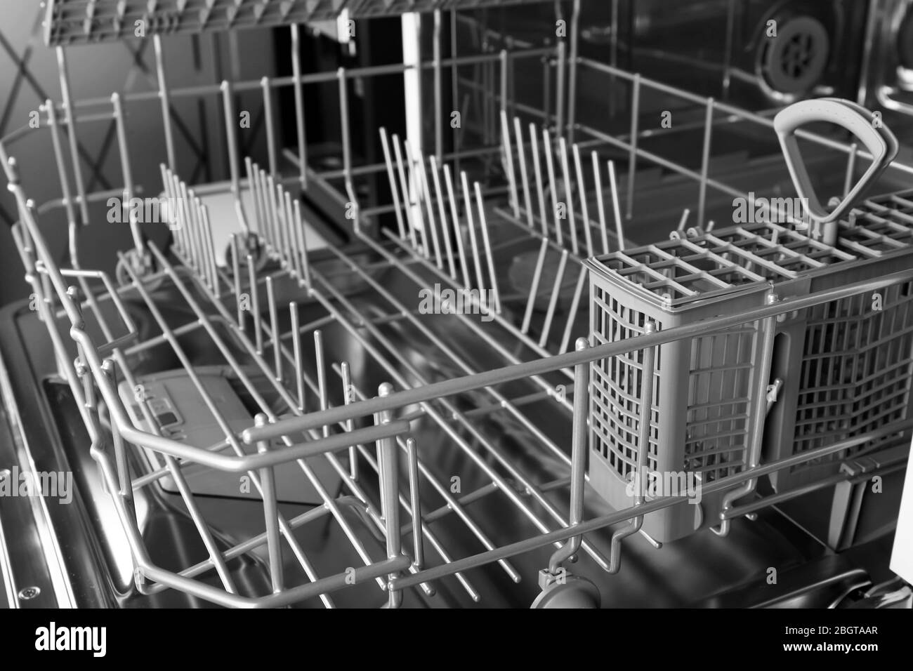 Open dishwasher without dishes in it Stock Photo Alamy