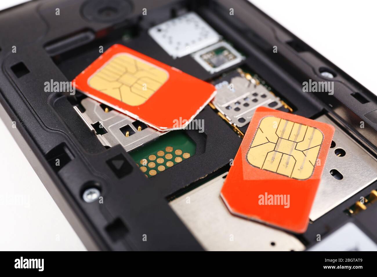 cell phone and two sim cards, close up Stock Photo Alamy