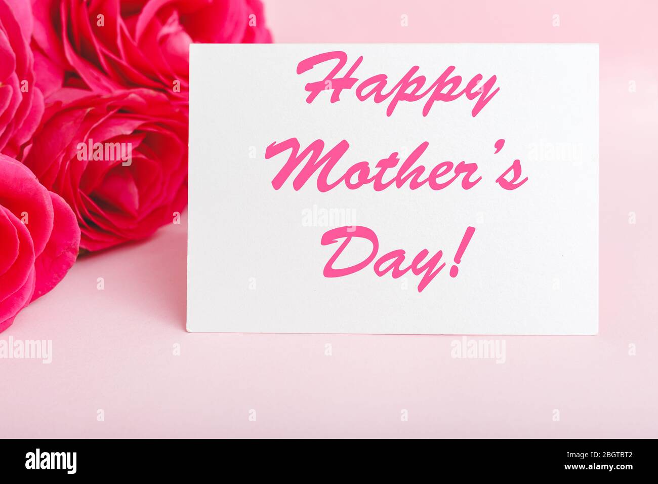 Happy Mothers Day text on gift card in flower bouquet of pink roses on ...