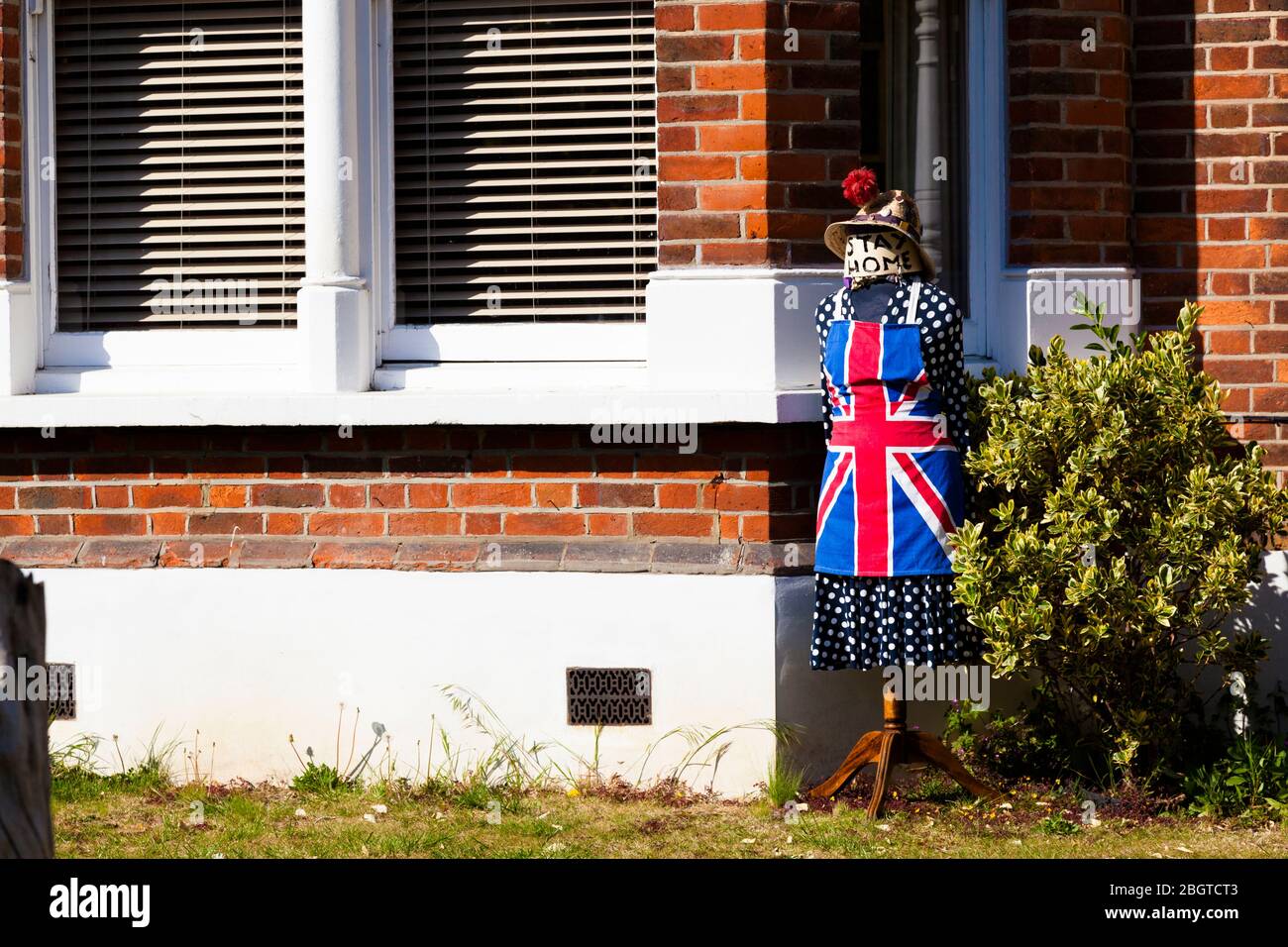 Union Jack apron on a 'Stay at Home' covid-19 message, London, UK Stock Photo