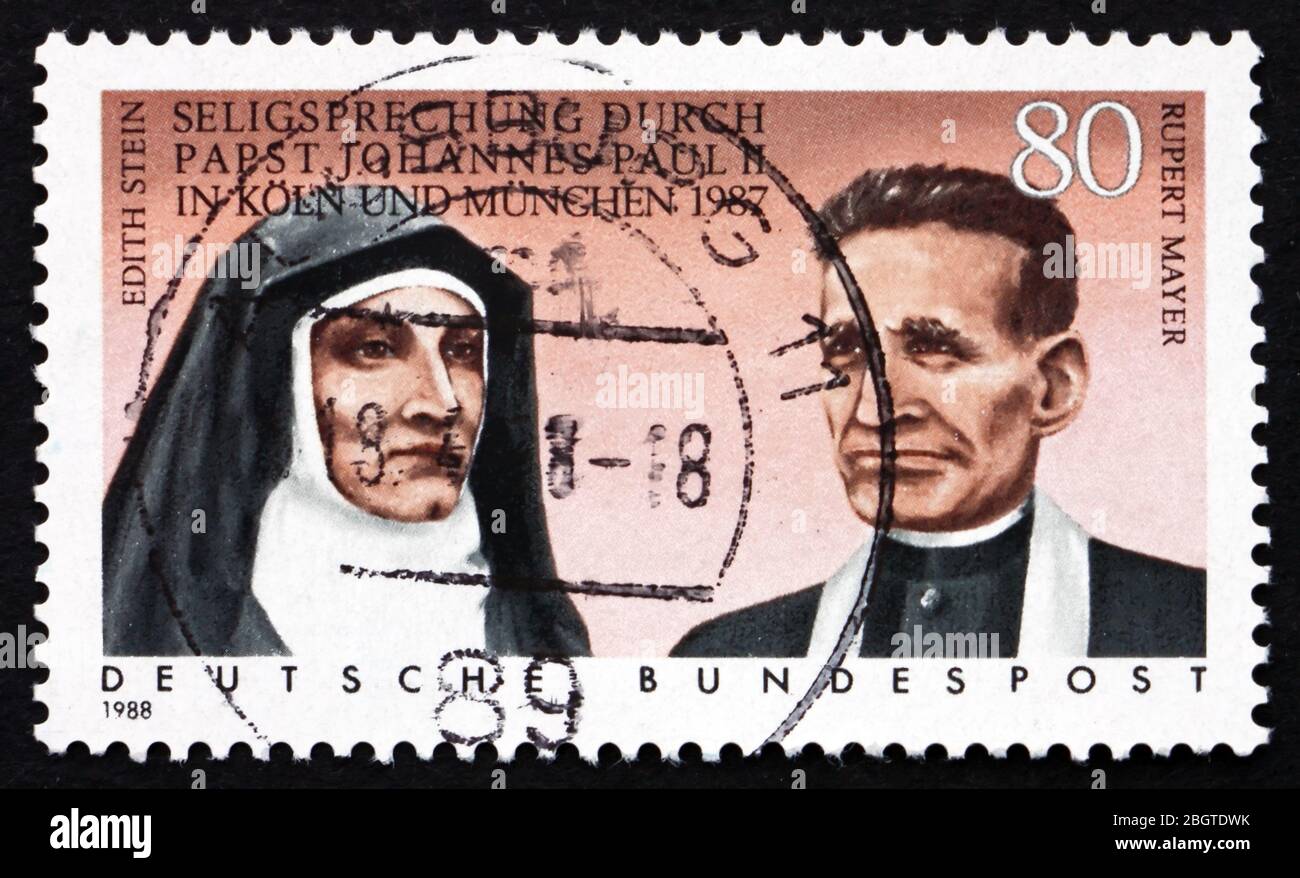 GERMANY - CIRCA 1988: a stamp printed in the Germany shows Beatification of Edith Stein and Rupert Mayer by Pope John Paul II in 1987, circa 1988 Stock Photo