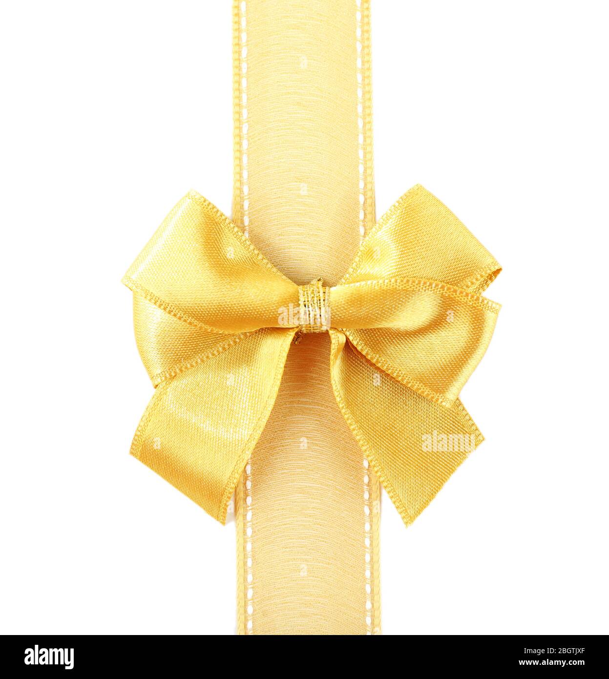 Golden ribbon and bow isolated on white Stock Photo - Alamy