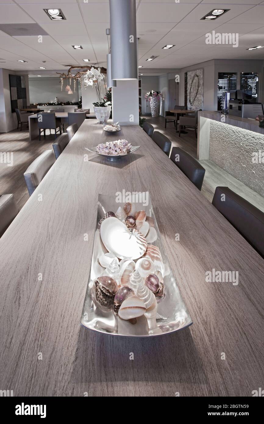 table at empty hotel restaurant in the Netherlands Stock Photo