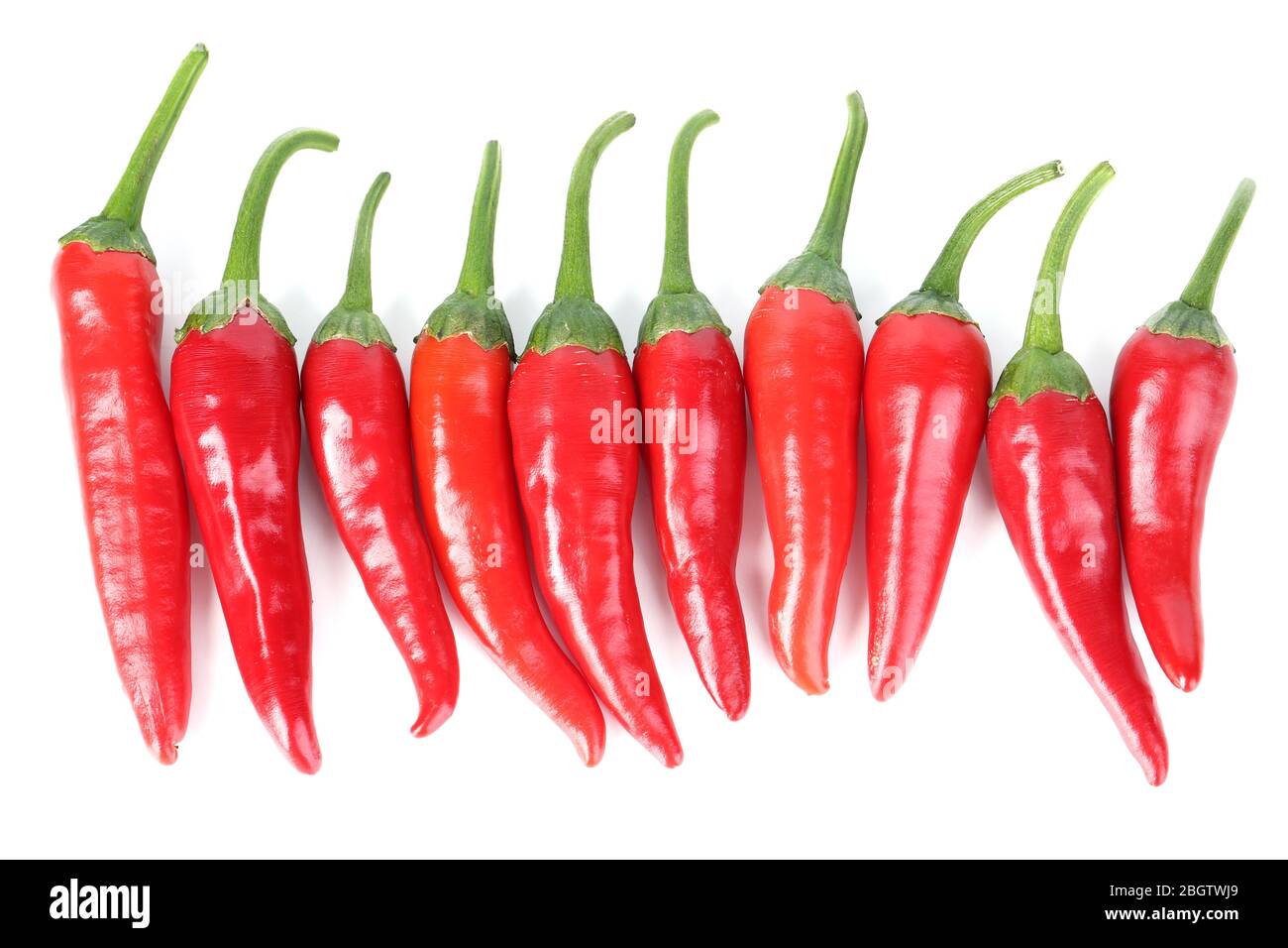 Red hot chili peppers isolated on white Stock Photo - Alamy