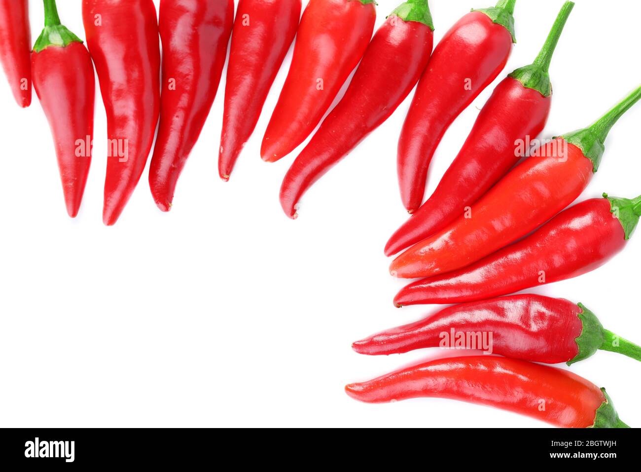 Red hot chili peppers isolated on white Stock Photo - Alamy