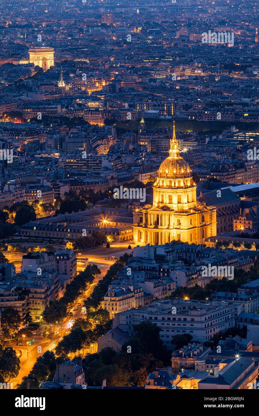 Paris aerial with Les Invalides, France. Twilight aerial view of Paris, France from Montparnasse Tower with Les Invalides building and Arc de Triomphe Stock Photo