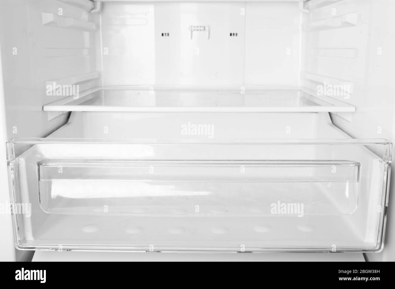 Empty refrigerator shelves closeup Stock Photo
